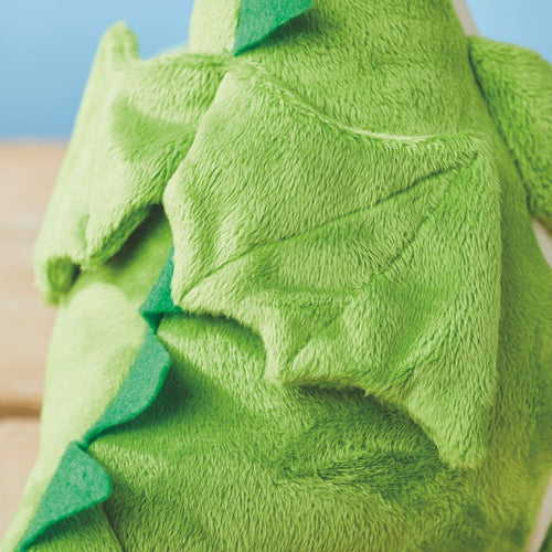 Close-up of a green textured fabric with a blue background