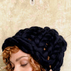 A blue arm knitted hat