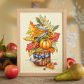 Framed cross-stitched picture of a pumpkin and autumn leaves with fruits on a wooden surface.