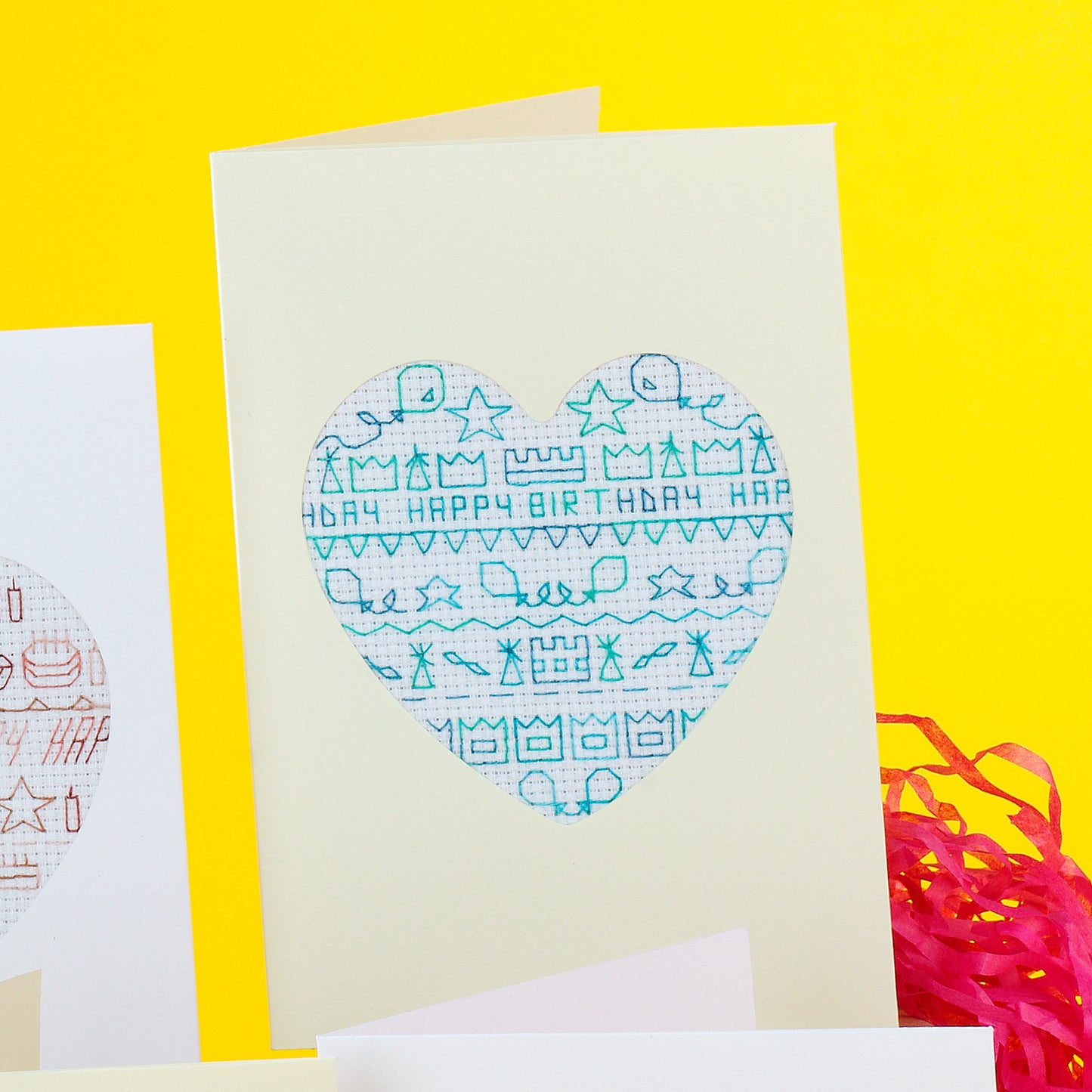 Greeting card with heart design and 'Happy Birthday' text on a yellow background
