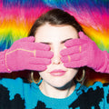 Pink gloves knitting pattern with gold ring details