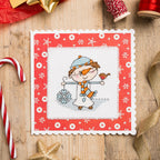 Cross-stitched design of a winter scene with snowflakes on a wooden surface with Christmas decorations.