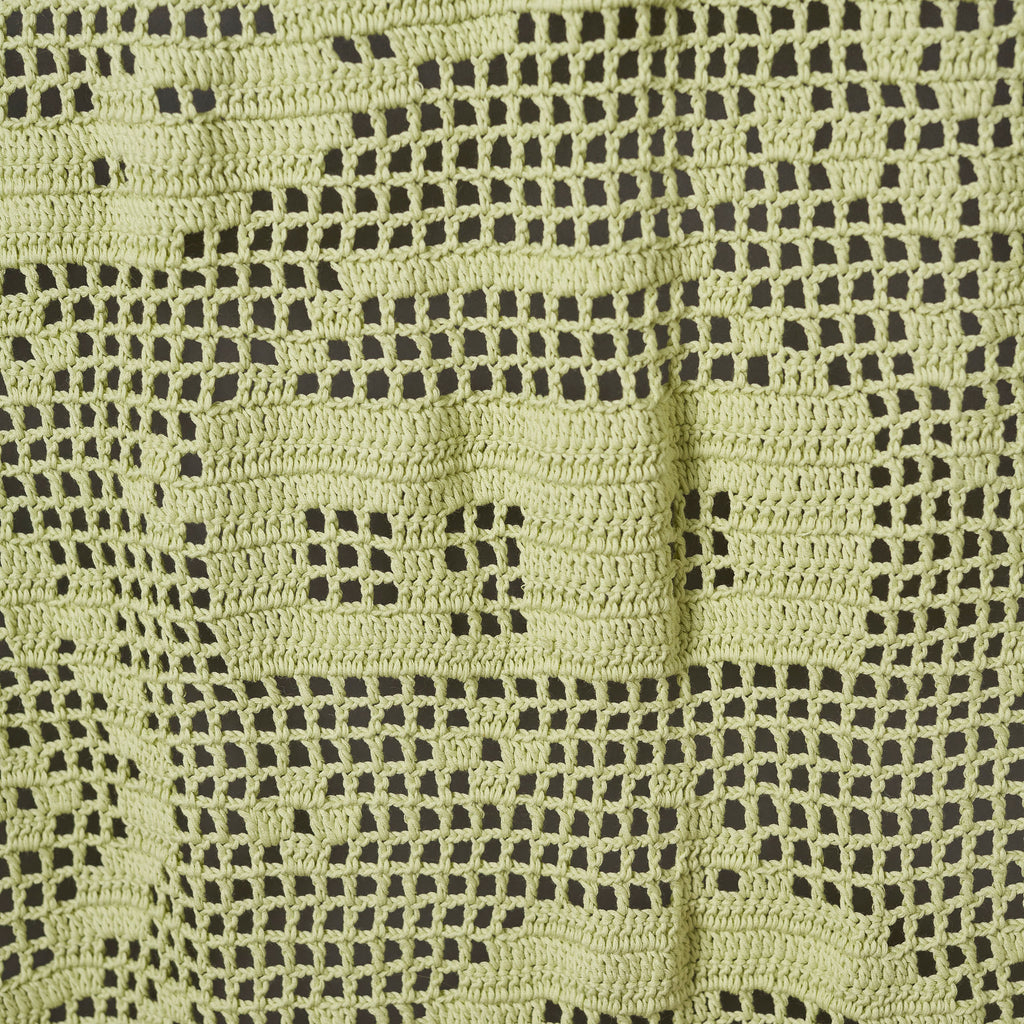 Close-up of a green and black patterned fabric