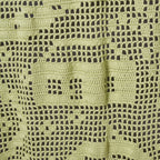 Close-up of a green and black patterned fabric