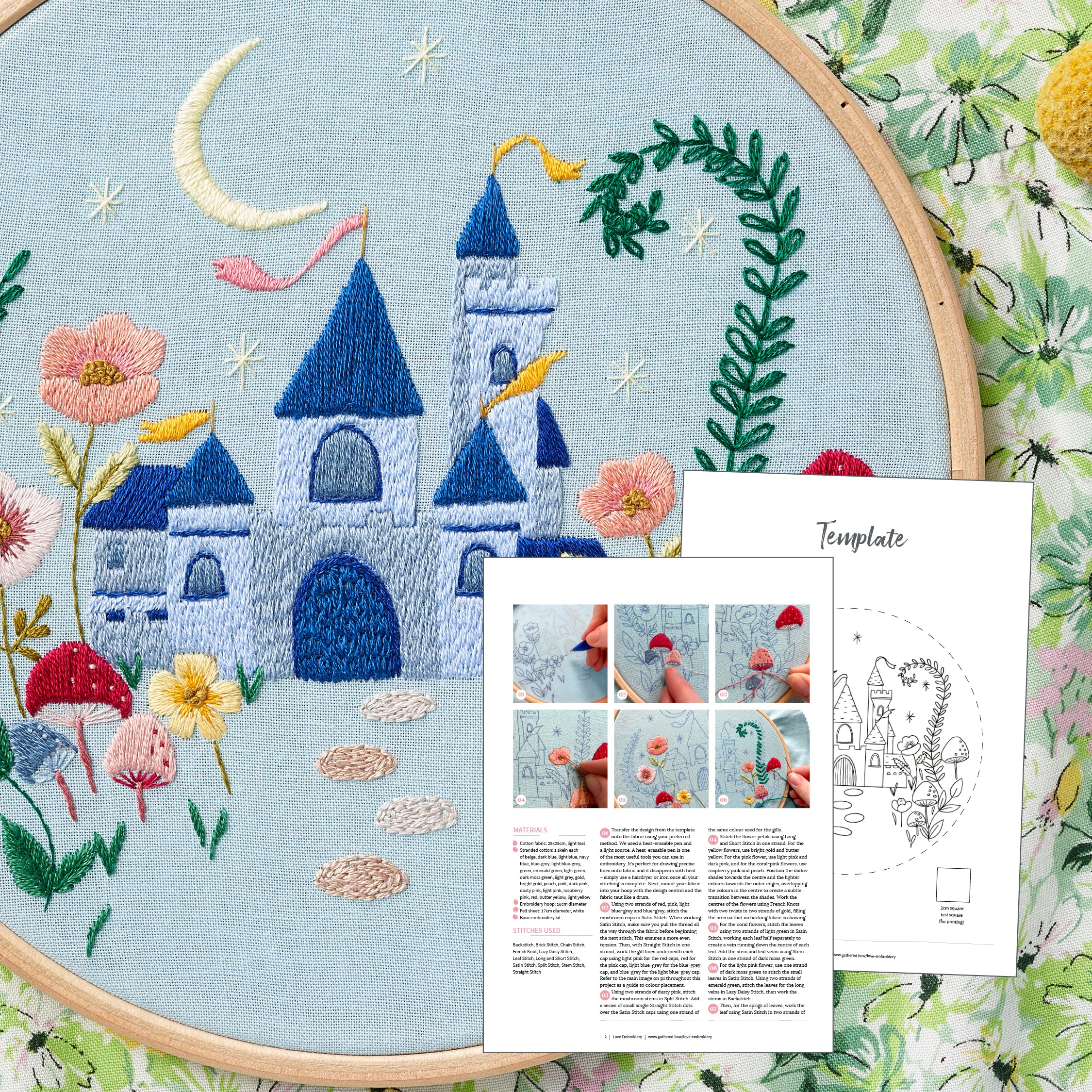 Embroidery hoop with castle design and template on a floral background