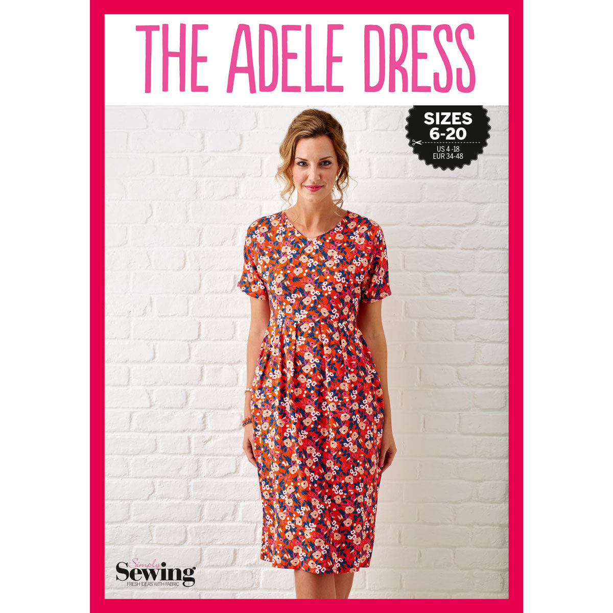 Woman wearing a bright floral dress stands against a white brick wall. "The Adele Dress" is printed above. Sizes 6-20 and a sewing logo are visible. Vibrant and cheerful mood.
