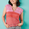 Woman wearing a pink and red striped sleeveless top against a teal background