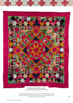 Vibrant quilt with intricate star patterns in red, green, blue, and gold. A dynamic, colorful design framed by a bold red border conveys warmth and artistry.