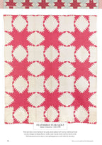 Pink and white quilt with a feathered star pattern, featuring intricate hand-quilted designs. The soft hues and detailed stitching convey a sense of warmth and craftsmanship.