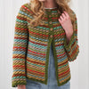 Colorful knitted cardigan worn by a person on a white background