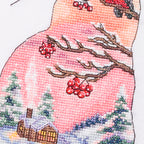 Cross-stitched design of a pink cat with red berries and a snowy landscape.