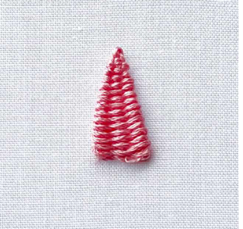 Red embroidery stitch with white fabric background