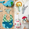 Collage of baby toys and bibs with a focus on colorful and patterned designs.